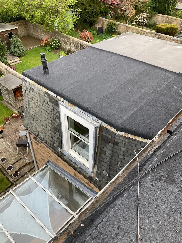 New flat roof covering on a dormer